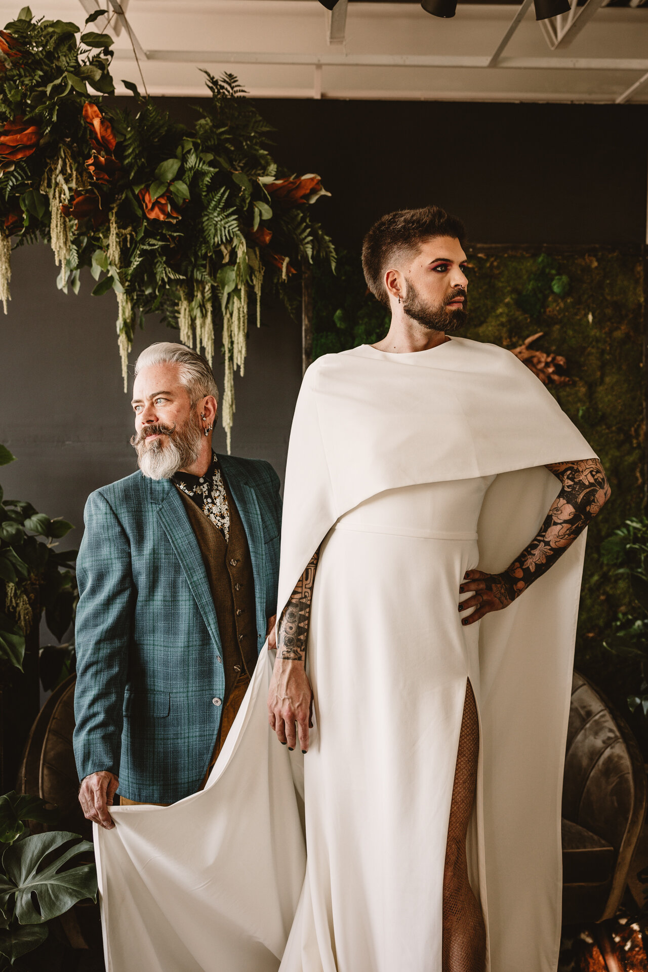  Lush + Leather intimate LGBTQIA+ styled shoot at Denver Photo Collective in the gorgeous Vagabond Zoe wedding gown and Eos cape photographed by Storih Photography 