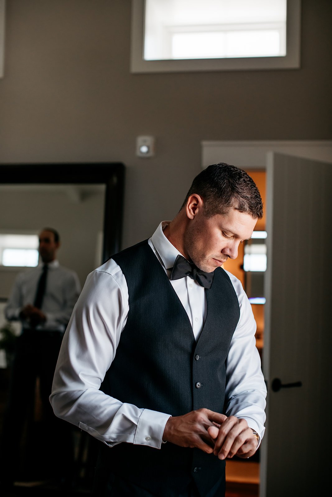  The groom getting ready for the couples’ big day in Manson, Washington. 