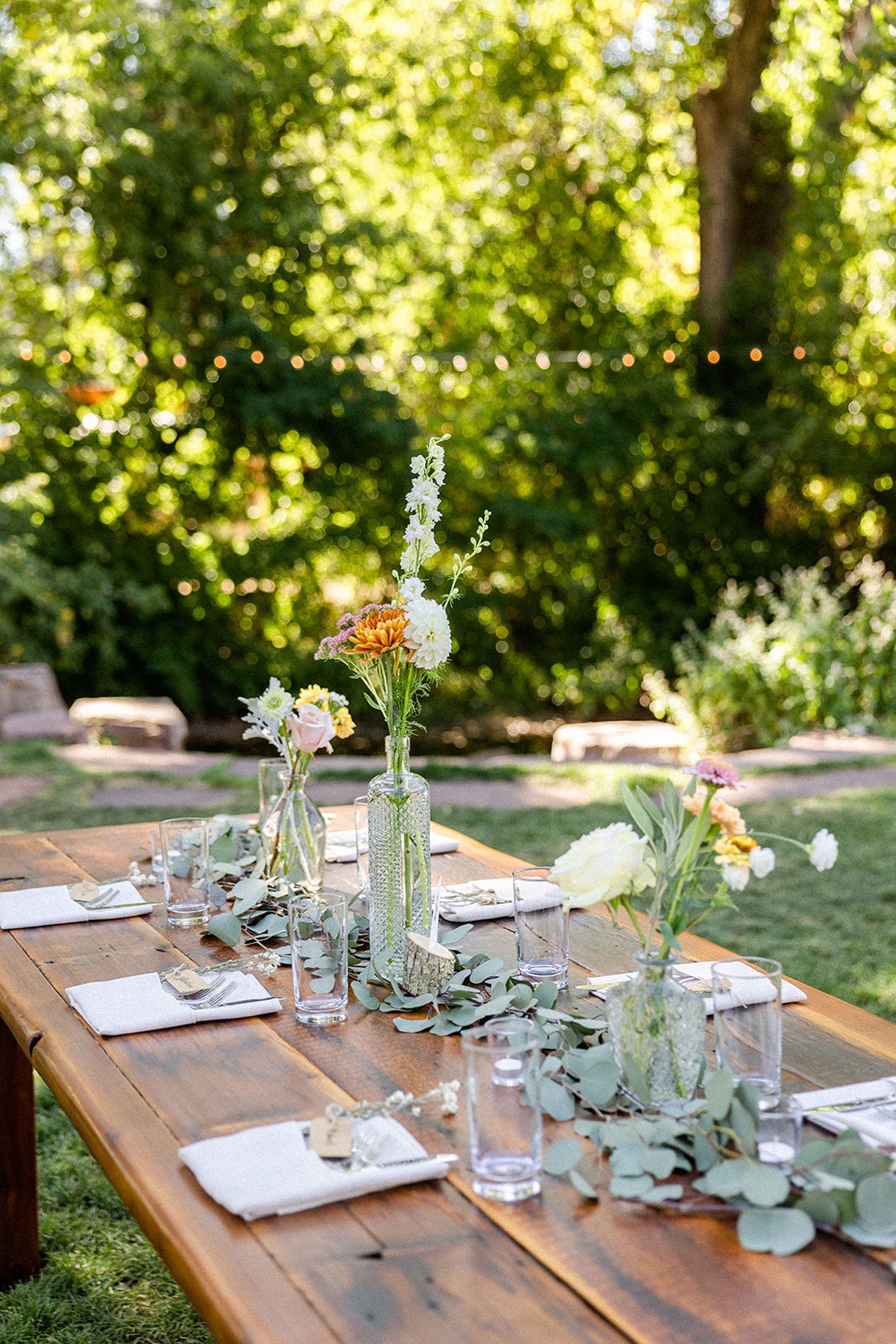  A beautiful backyard farm table place setting for a gorgeous Colorado mountain wedding. 