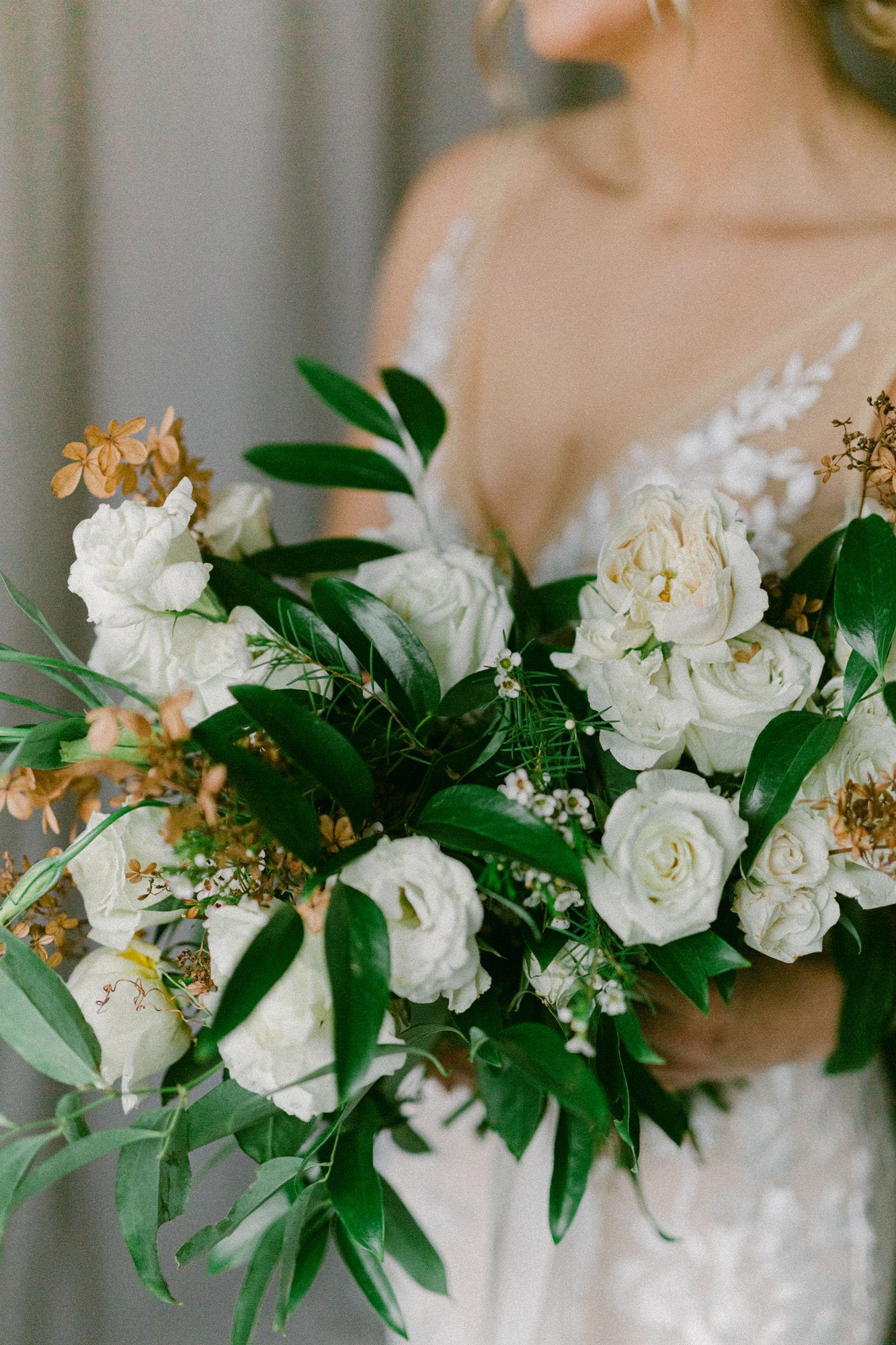  a gorgeous natural bridal bouquet of greenery and white florals 