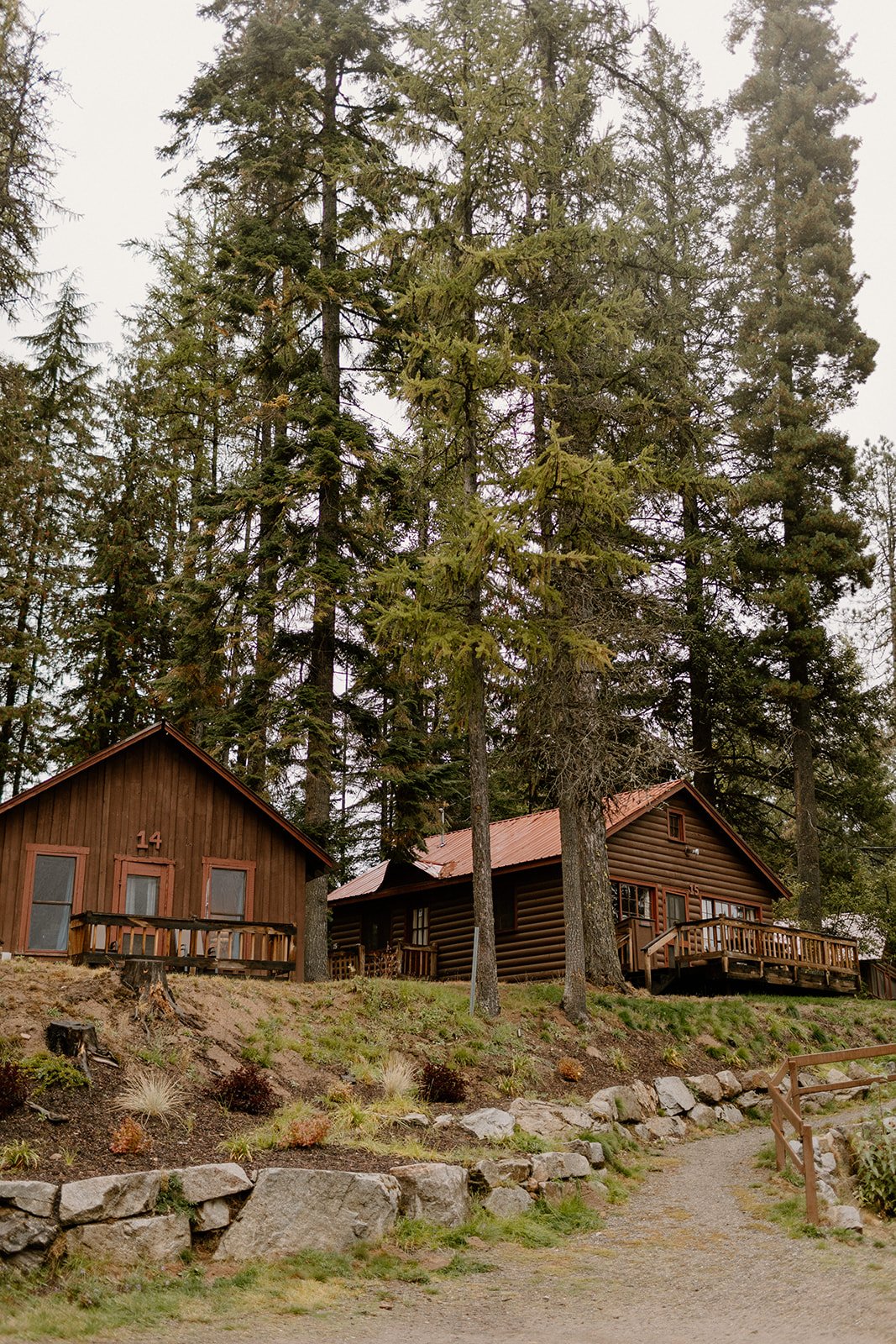 cabin wedding venue featuring an aandbe real bride wearing made with love wedding dress