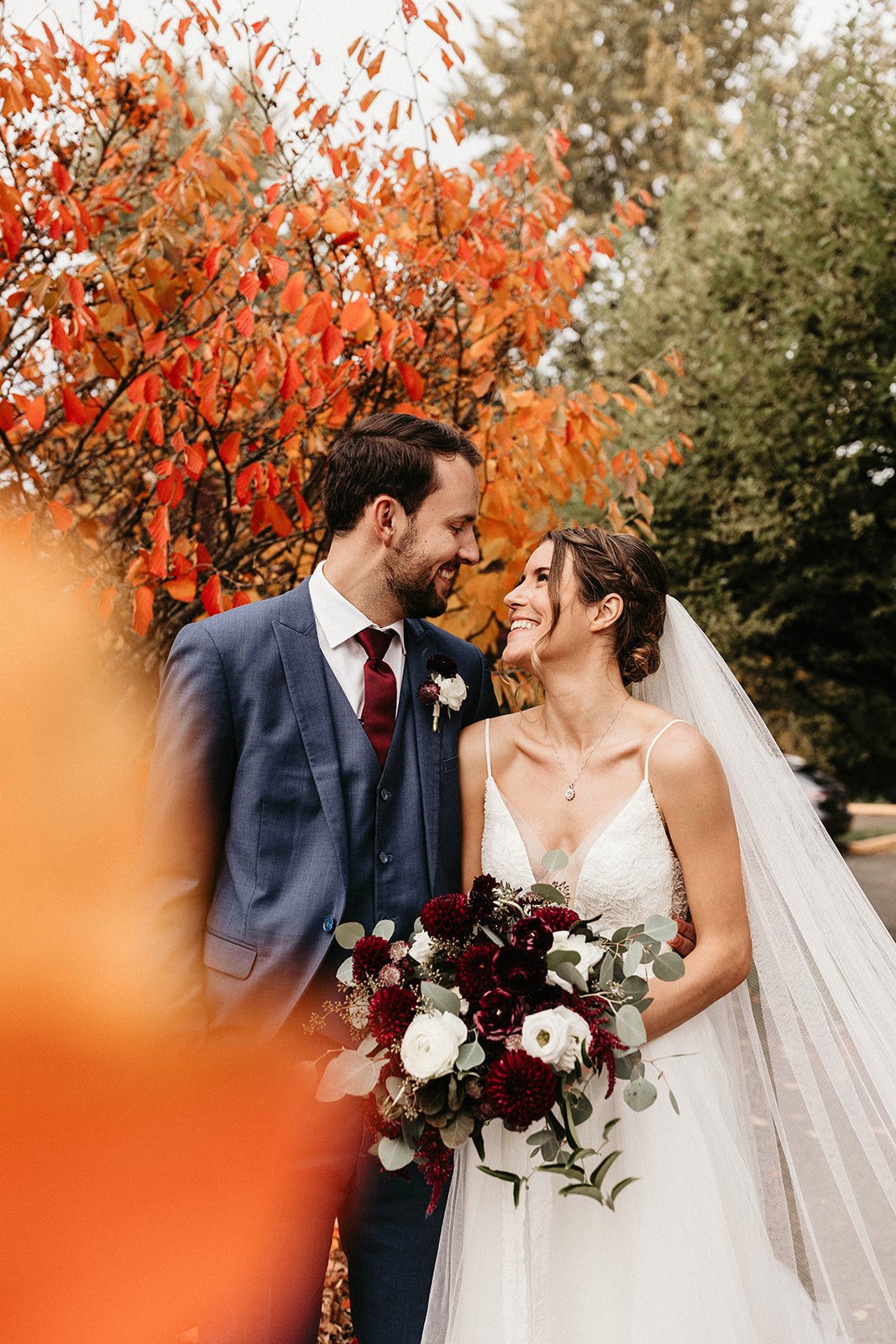 fall wedding inspiration in a a-line flowy truvelle wedding dress with veil