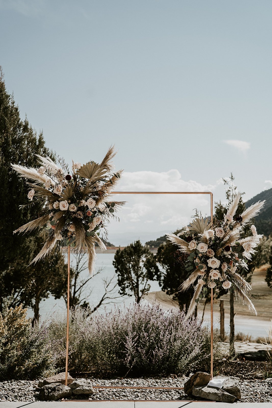 rustic boho modern wedding alter inspiration with pampas grasses