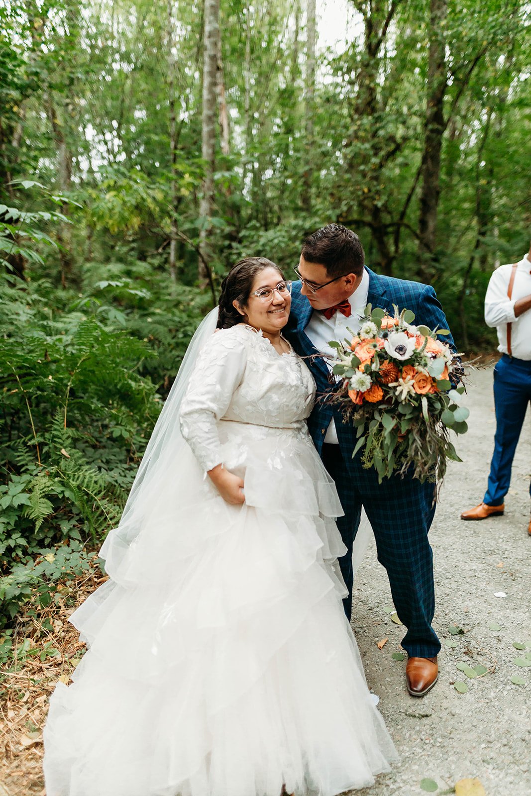 outdoor wedding ceremony in a wtoo ball gown