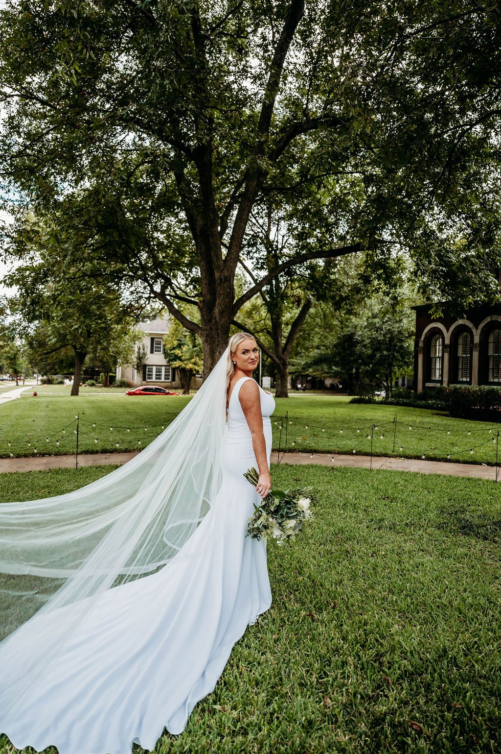 sydney stretch crepe modern wedding dress by alyssa kristin on a plussize bride