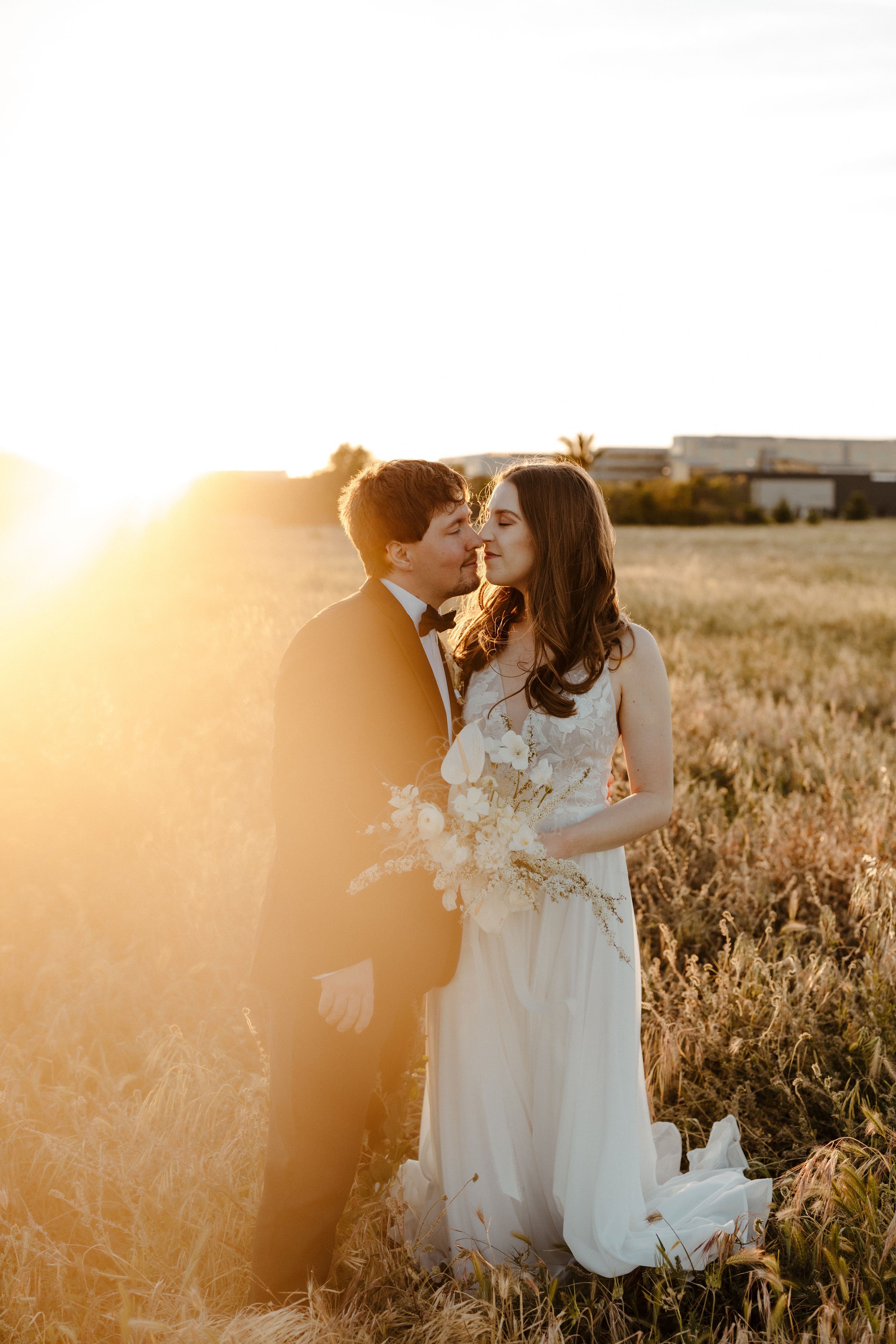 bridal portraits during golden hour in a field wearing jenny by jenny yoo