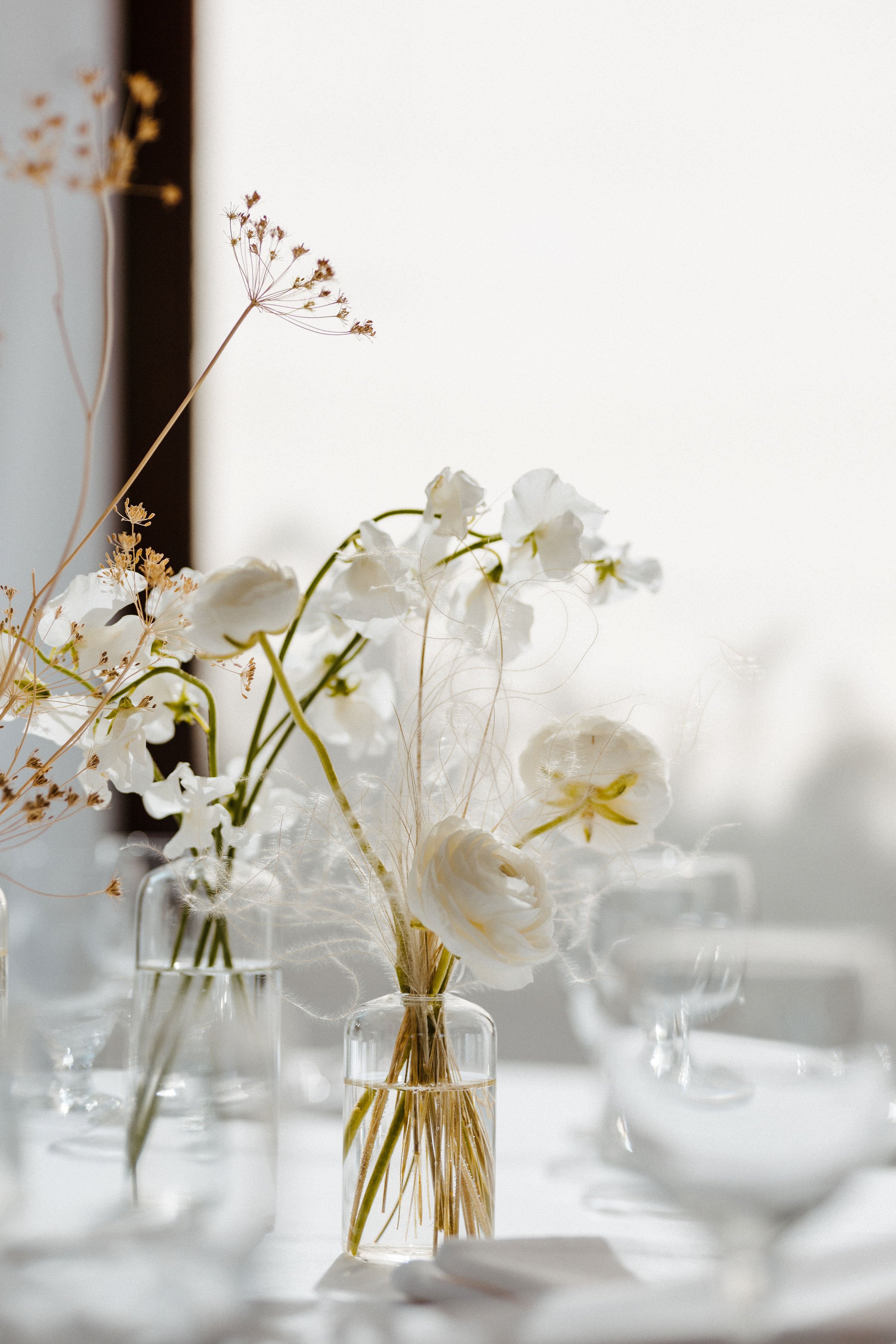 delicate bridal floral on a white tablescape