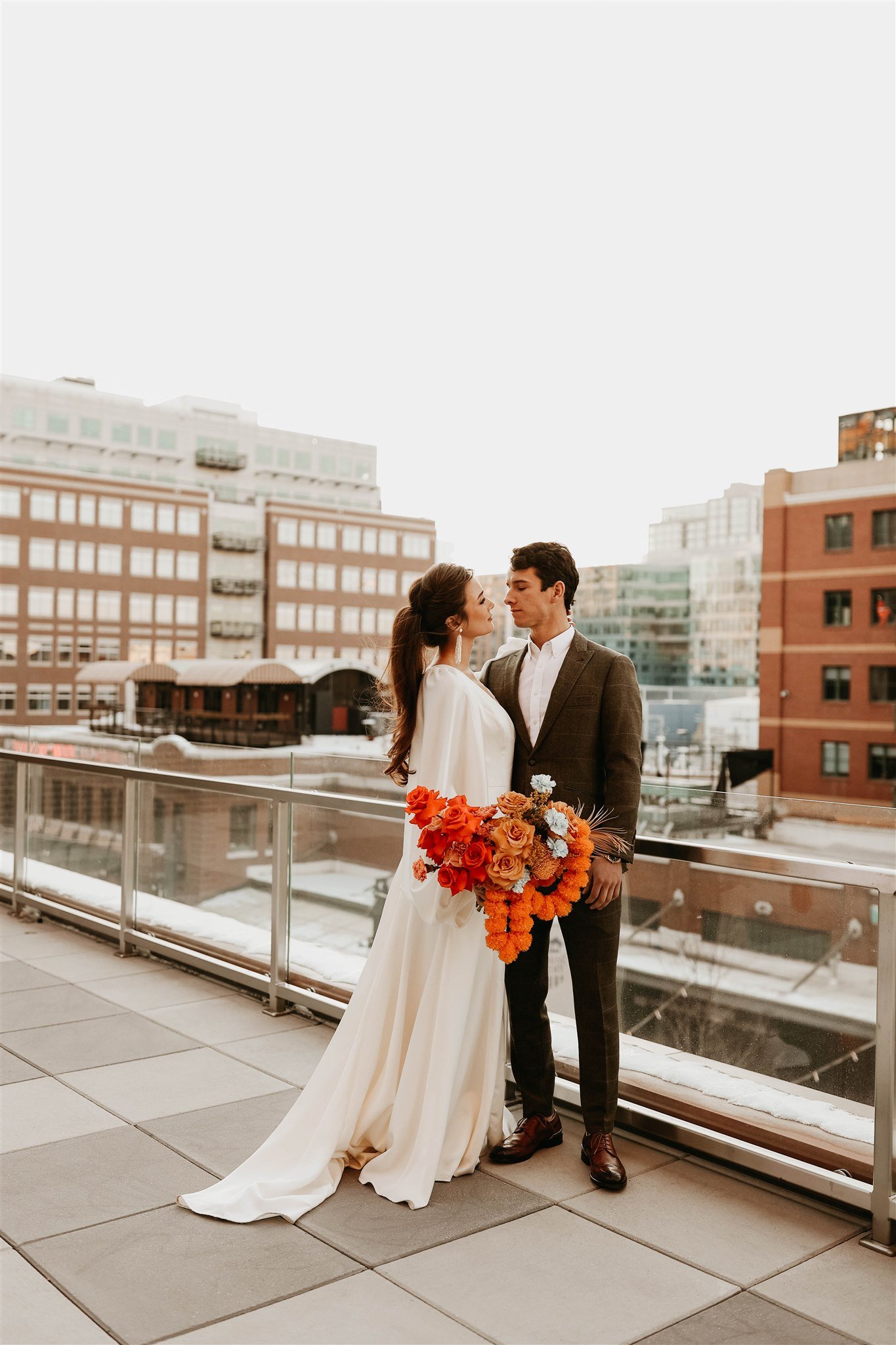 a blumenhaus bouquet in a stlyed rooftop wedding in denver colorado.