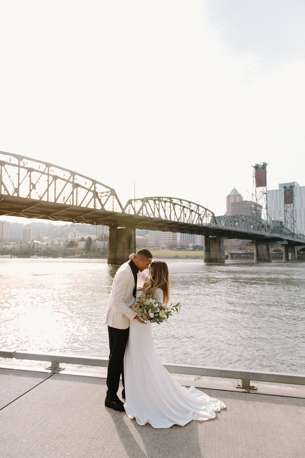 downtown portland city wedding inspiration featuring a long sleeve wedding dress from a&amp;be bridal shop.