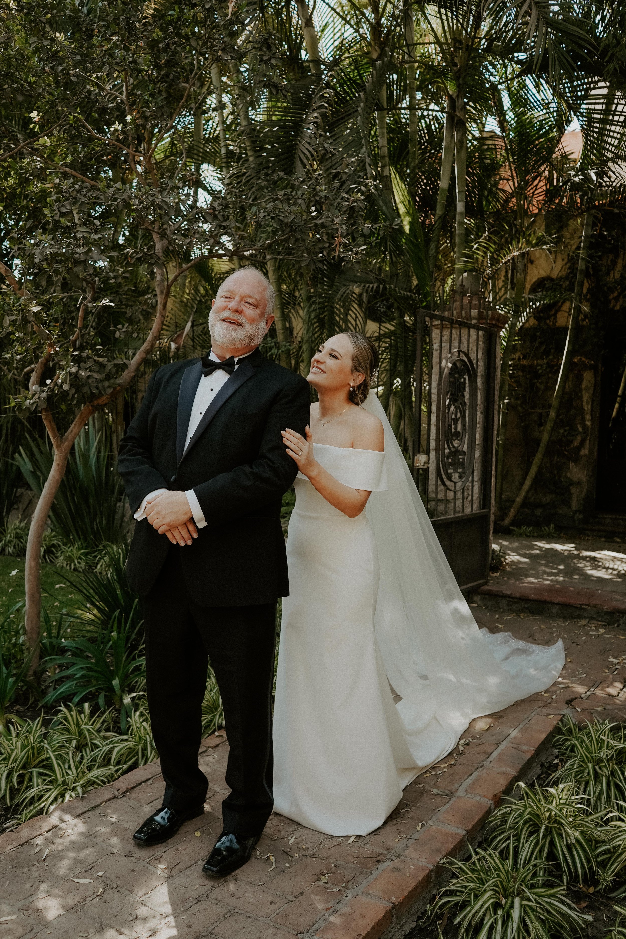 father of the bride first look in this stunning destination wedding featuring vagabond wedding dress.