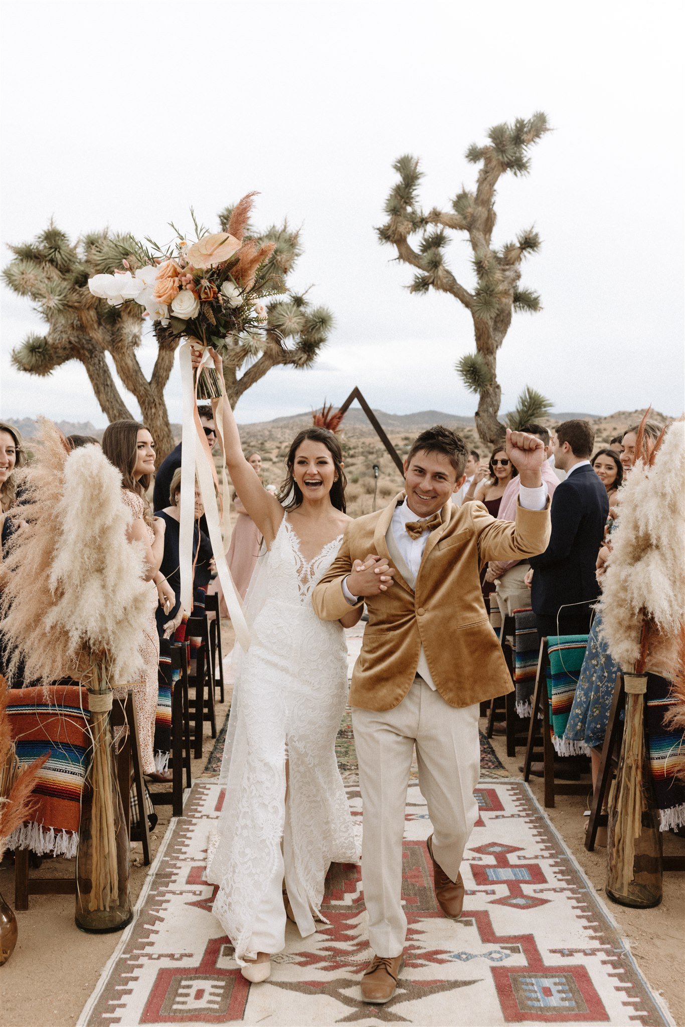 boho wooden arch for wedding ceremony in the desert