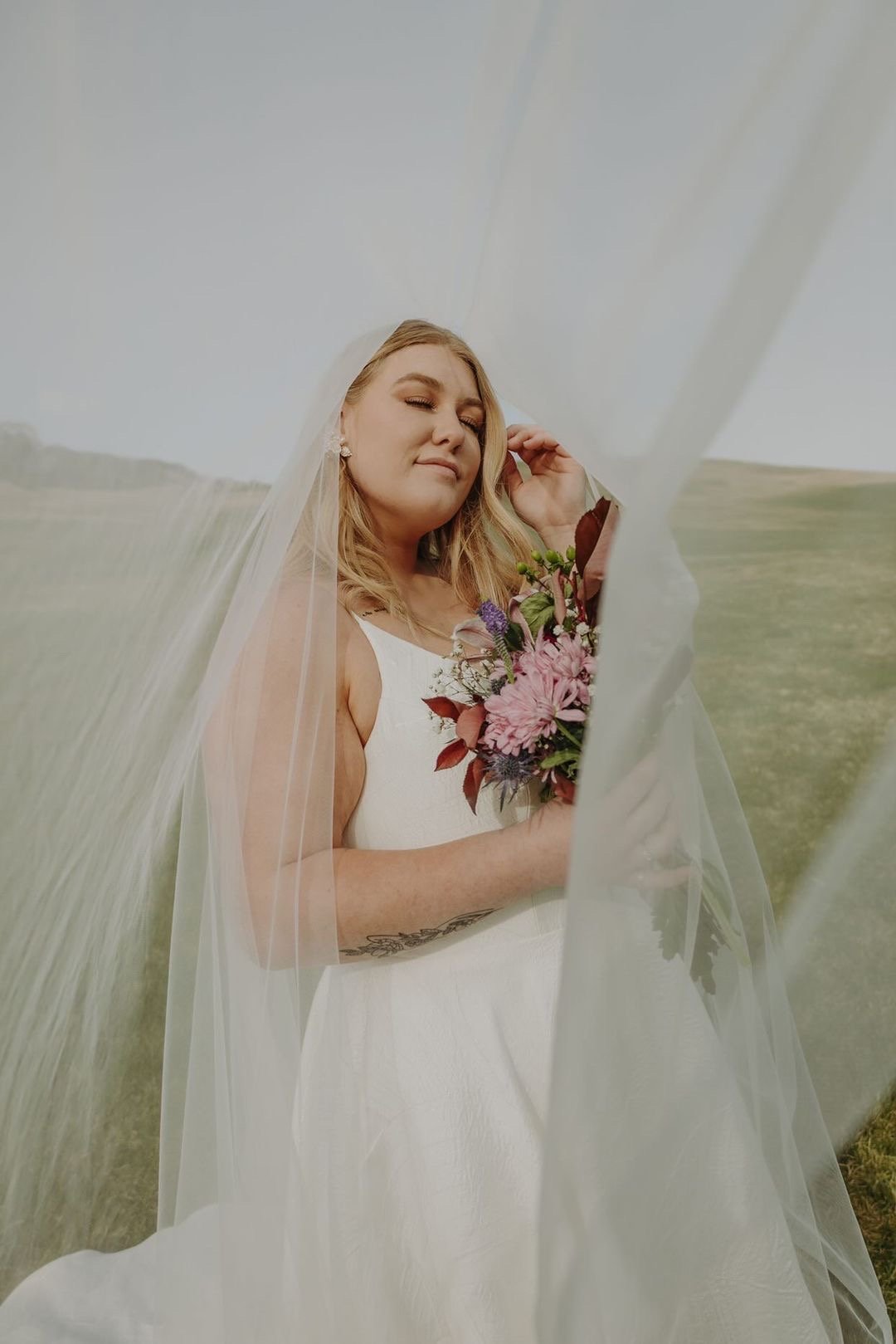 a unique veil image in this outdoors styled shoot featuring truvelle