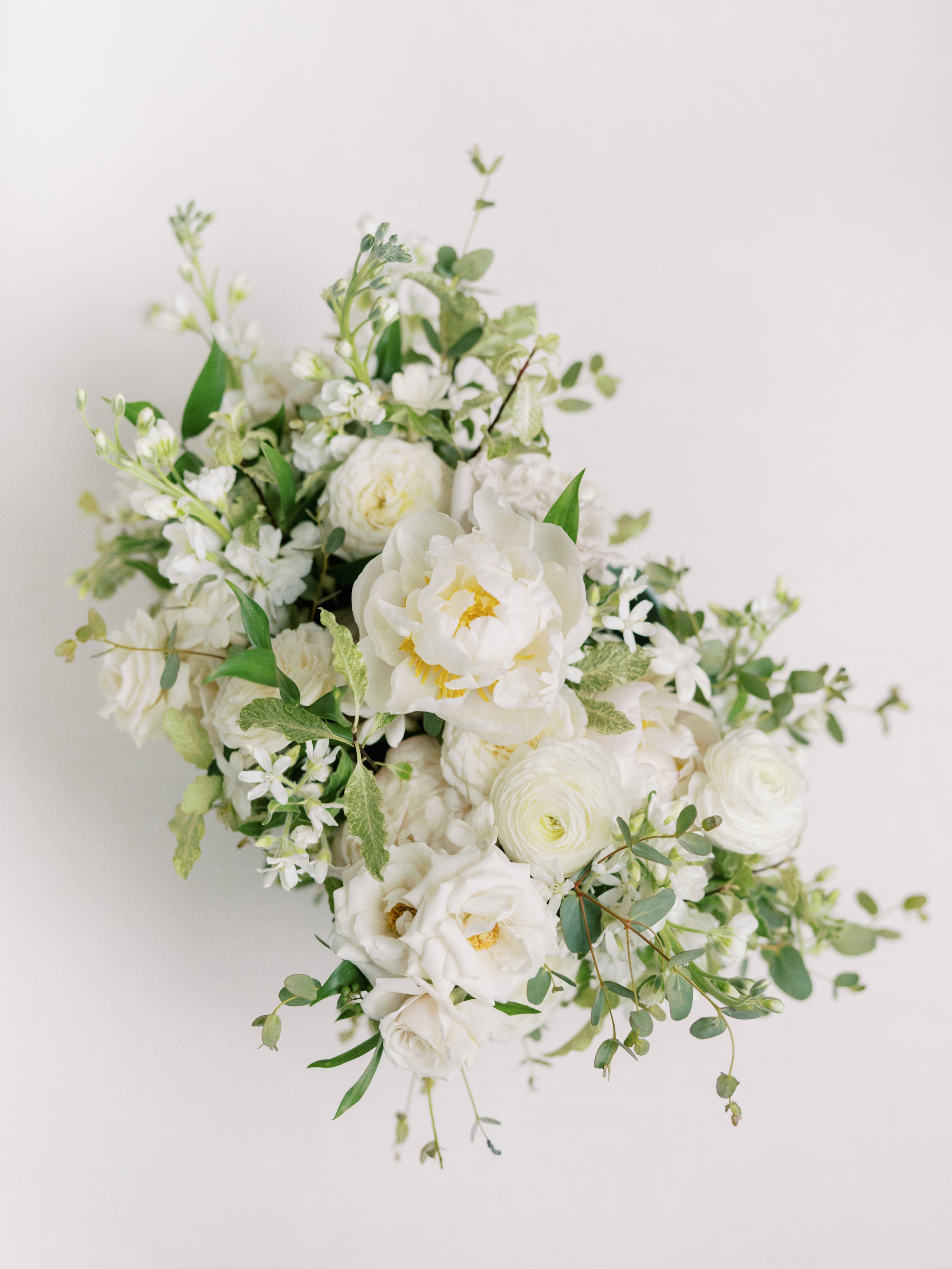 classic white wedding bouquet on a white background