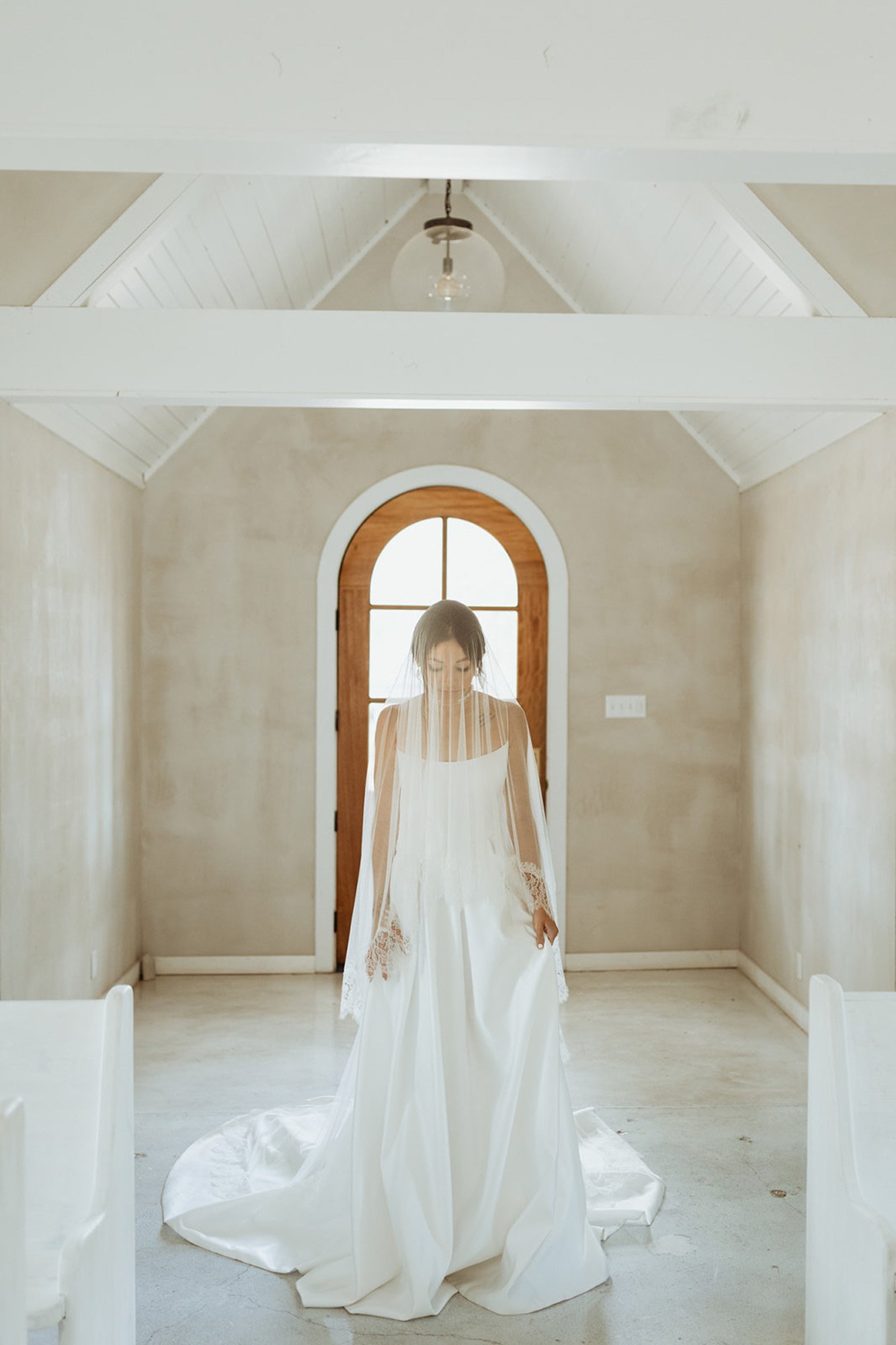 a styled wedding at the emerson venue in texas featuring a vagabond wedding dress