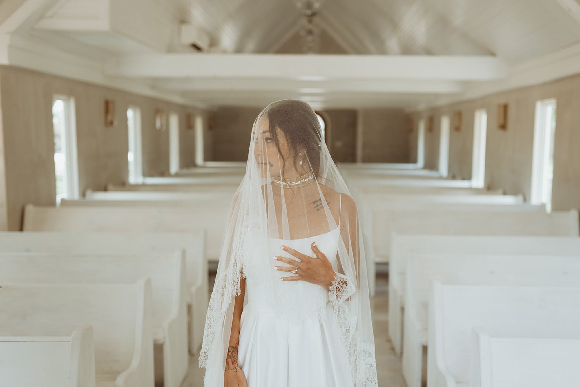 the leanne ford designed wedding venue in texas called the emerson featuring a bride wearing a vagabond wedding dress from a&amp;be dallas bridal shop