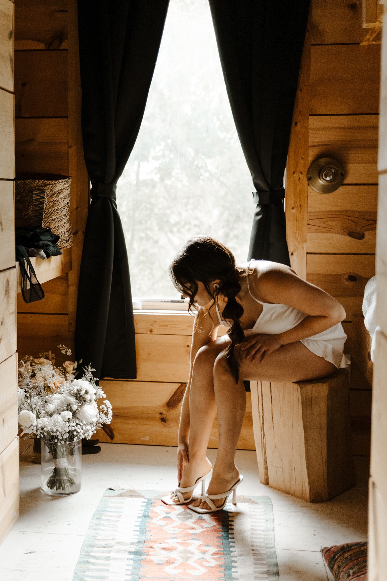 a bride getting ready at the wilde house in texas a cool wedding venue for a micro wedding