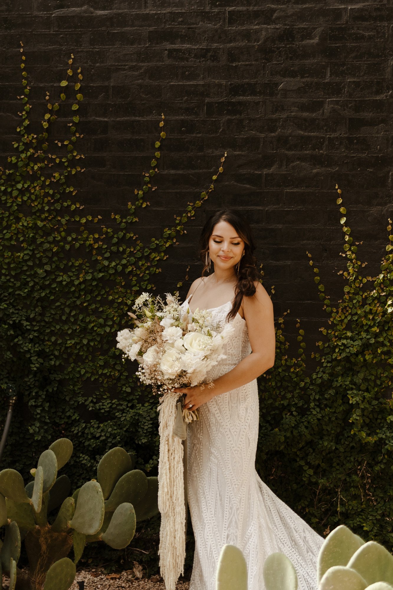 a rue de seine wedding dress on a styled bride in a texas micro wedding venue