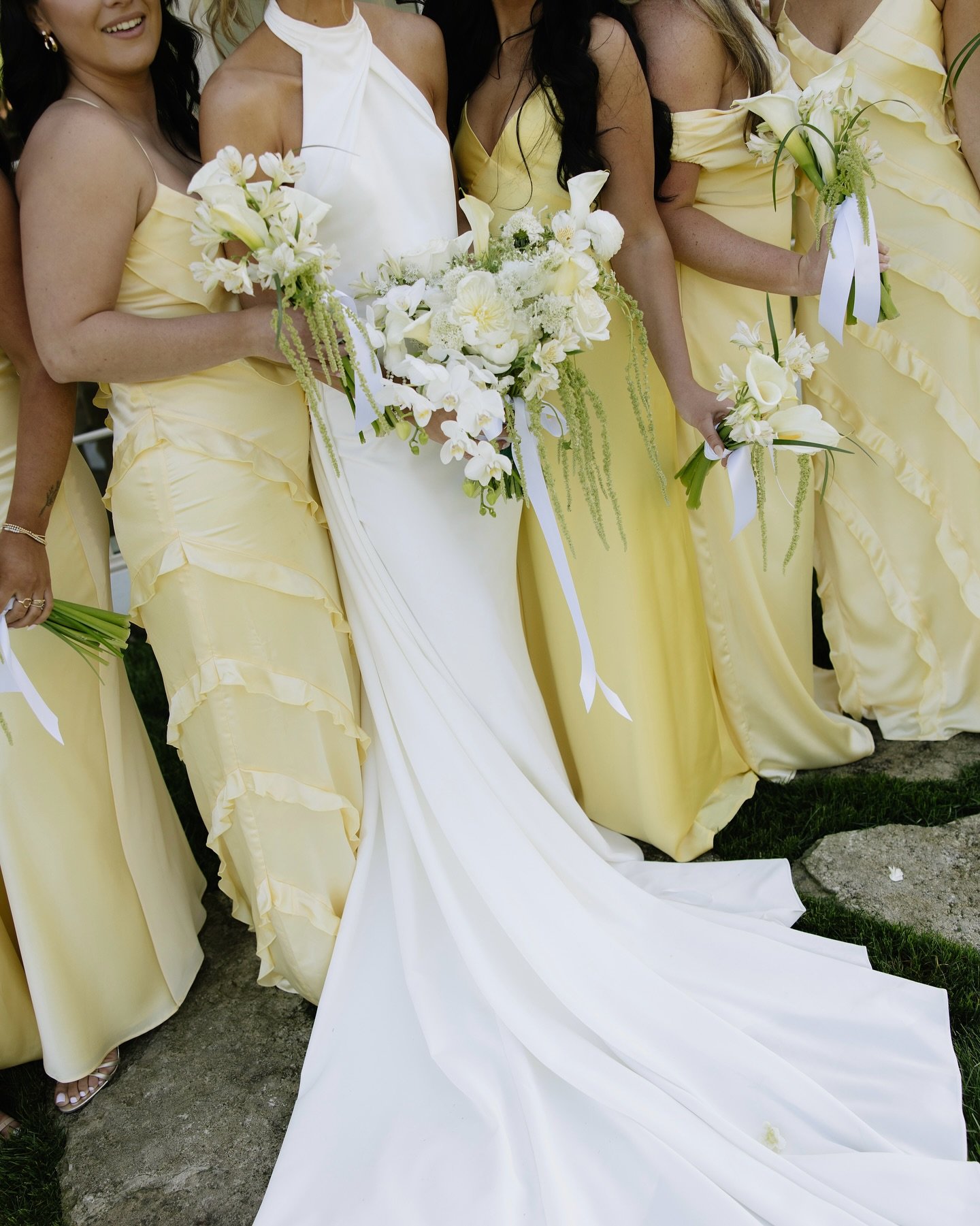 #aandbabe natalie &amp; her babes in butter yellow &hearts;

photo @byclairehadler 
dress @madewithlovebridal via @aandbe_dallas 
veil @saragabrielveils 

butter yellow wedding, butter yellow trend, wedding trends, yellow bridesmaids, 2026 bride, dal