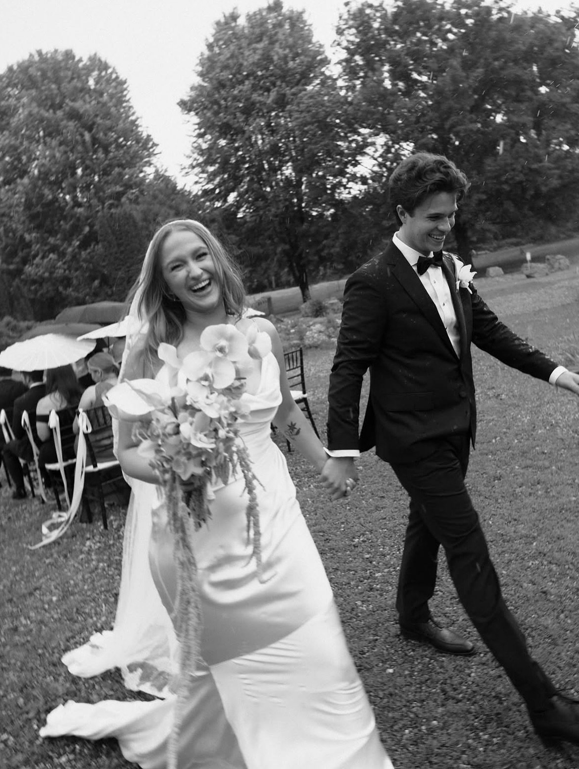 no rain, no flowers 🖤 #annabebride bella + robbie&rsquo;s ultra-chic, rainy and romantic wedding day in @katherinetash. 

photo @g.marieimages 
florals @scarlettandflora 
gown @katherinetash via @annabe.minnesota 

minnesota bride, minneapolis brida