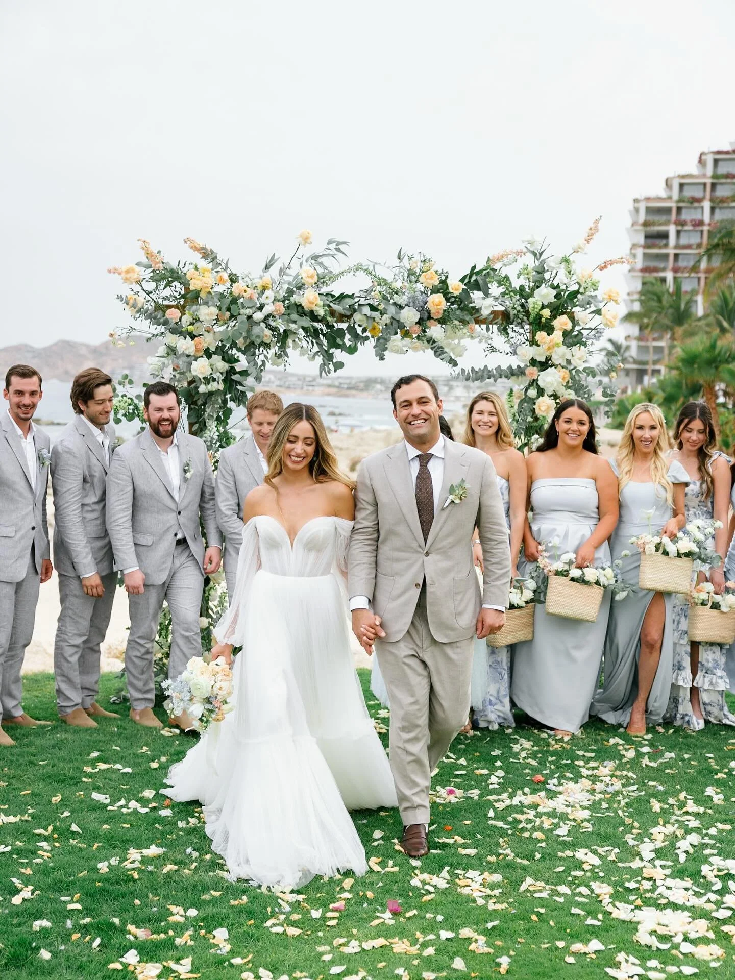 let&rsquo;s celebrate this beautiful day of #aandbabe mariana &amp; jake! 🥂

dress @aandbe_austin @alenaleenabridal 
photo @mcw_photocinema 
venue @mardelcabohotel 
planning @ariannaocampocreative 
florals @caboflowerss 

wedding, wedding photos, re