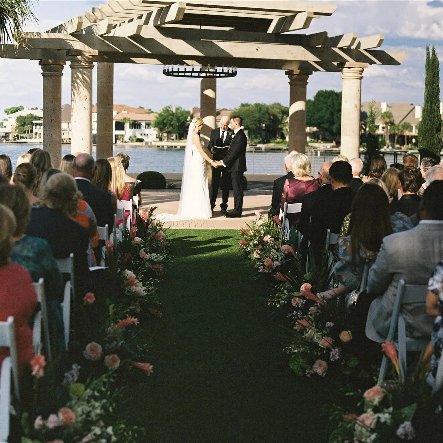 #aandbabe katherine &amp; daniel in @alenaleenabridal, on film. 🤍

photo @anastasiastratephotography
planning @pearleventsaustin
florals @bouquetsofaustintx
venue @hsbresort
hmua @lolabeautytx
dress @alenaleenabridal via @aandbe_shops austin

#weddi