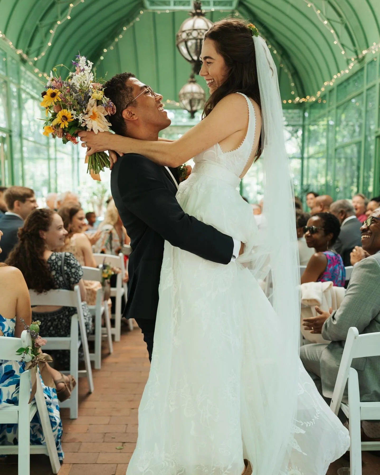 a&amp;b&eacute; real bride tess &amp; jesse in @rish_bridal 🤍 surrounded by lush greenery, all the stunning florals &amp; love we can feel through our screens 🥹

dress | charlie by @rish_bridal via @aandbebridalshop #denver

photos | @simoneschiess