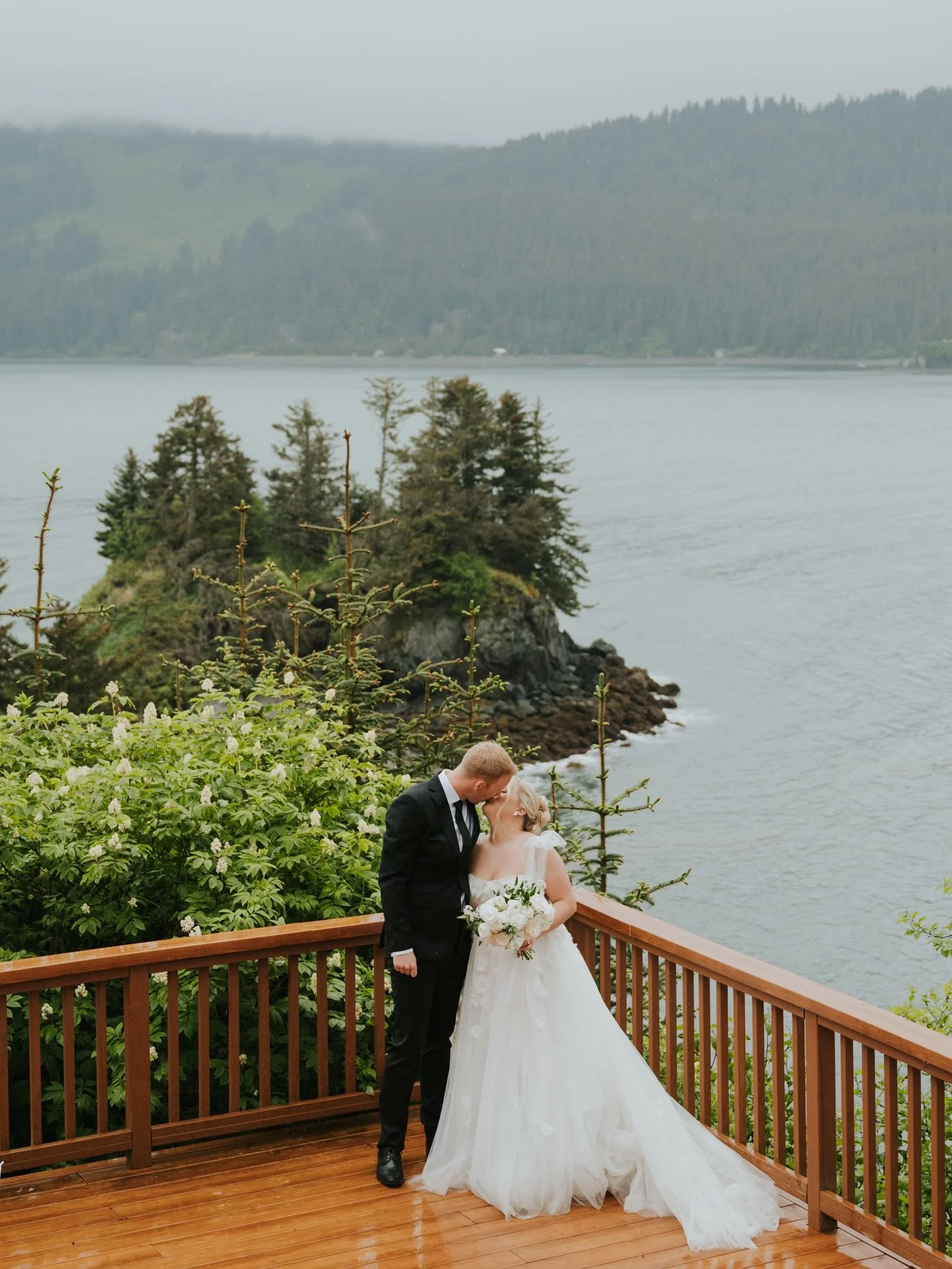 we have so much FOMO from this beautiful &amp; rainy wedding in alaska between a&amp;b&eacute; real bride denali &amp; chase! you can feel their love through the screen 🥺

congrats to the subitchs 🖤🥂

dress | habeneria by @alenaleenabridal via @aa