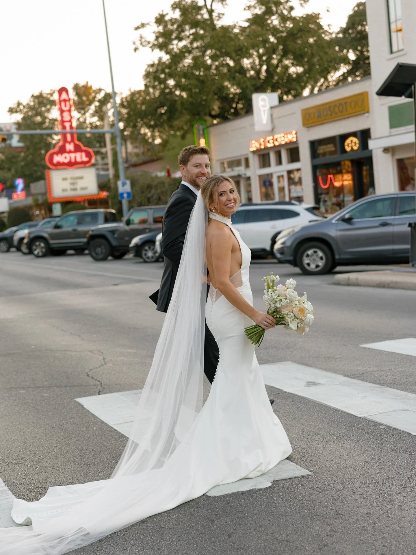 we love seeing the love between a&amp;b&eacute; real bride kendall &amp; ricky on their iconic wedding day in austin, texas! 🤠🤍 

congrats to the walneses! 🥂

dress | &lsquo;tris&rsquo; by @madilanebridal via @aandbebridalshop #austin
photos | @sa