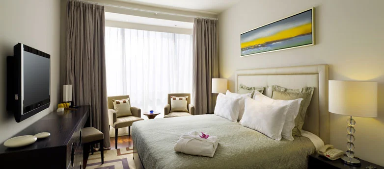 Serviced apartments are becoming a viable option for visitors to Hong Kong. Here is a room at Shama Central.
