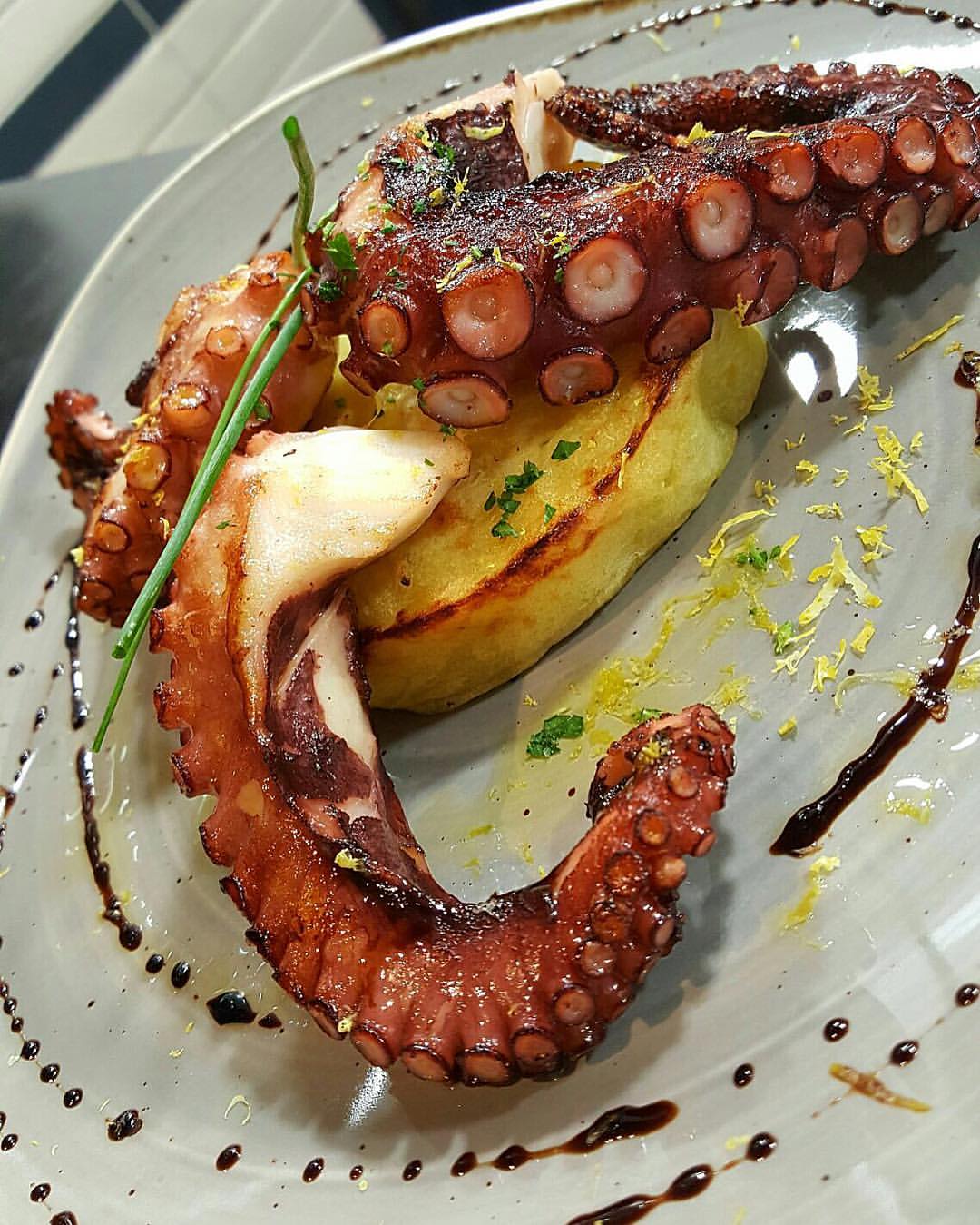 Roasted octopus and mashed potatoes and lemon at Sentimi. Credit: Sentimi