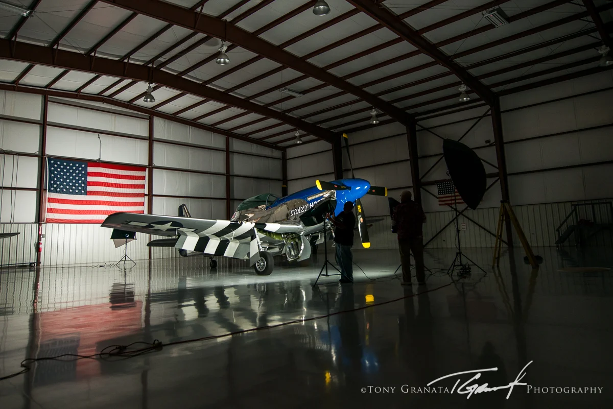 BTS image showing the (4) Westcott Spiderlite setup inside the hangar. 
