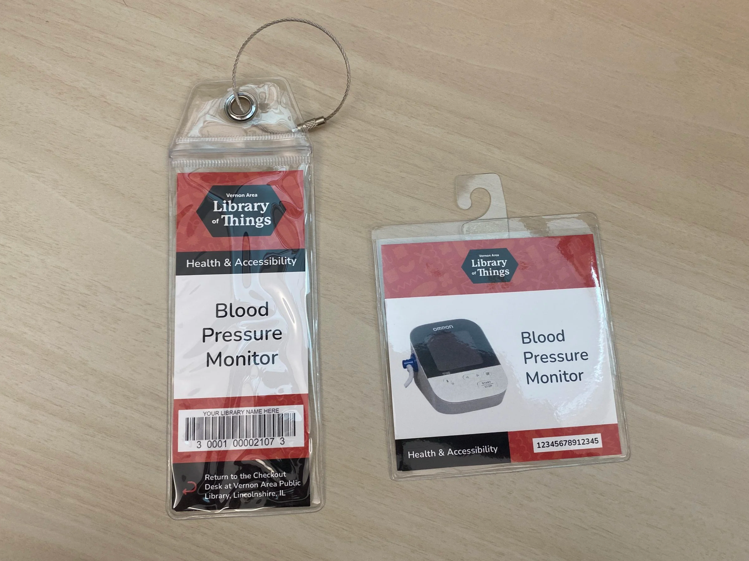 a long, red vertical tag and a red square card