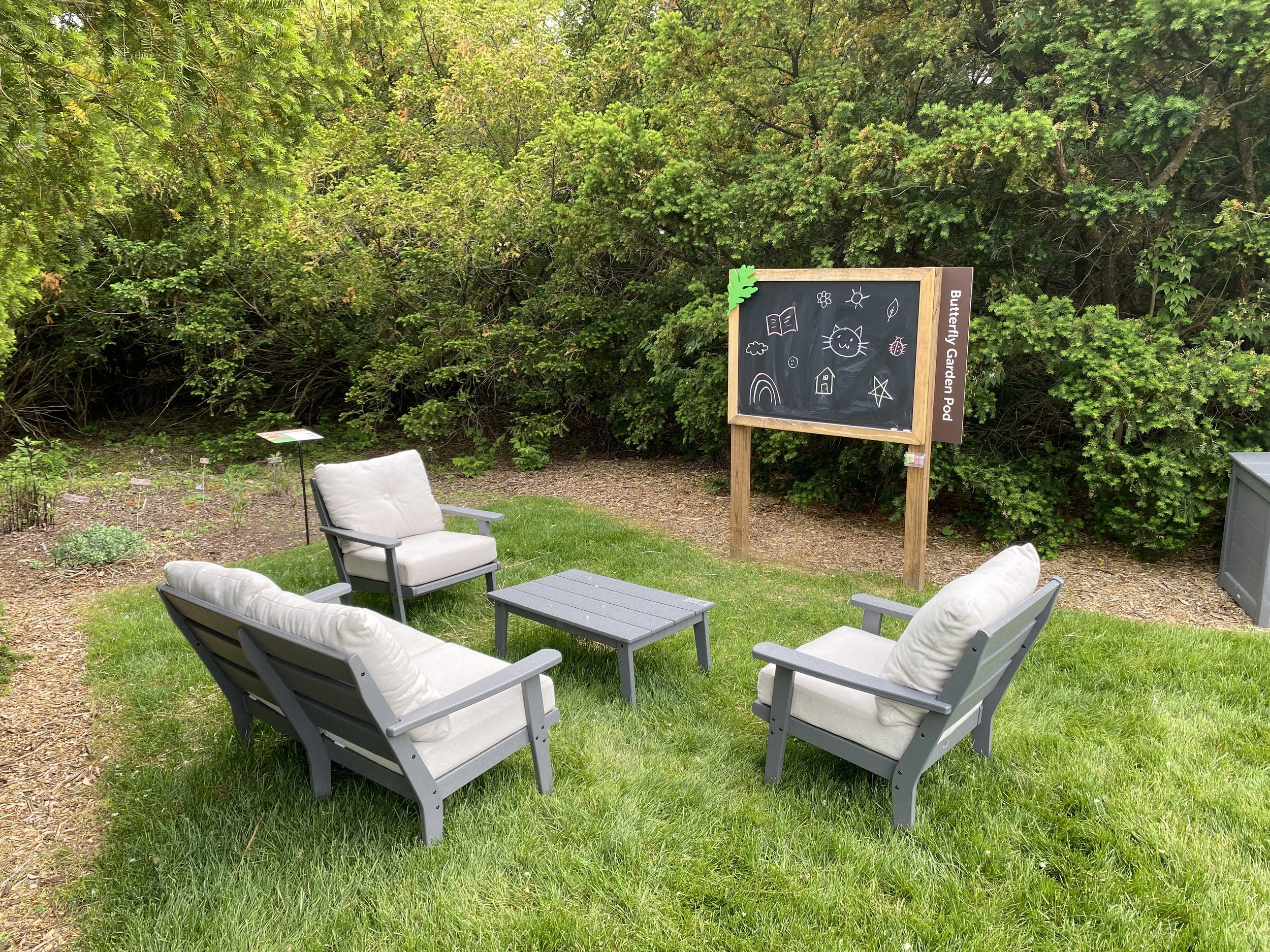 Outdoor seating with a chalkboard