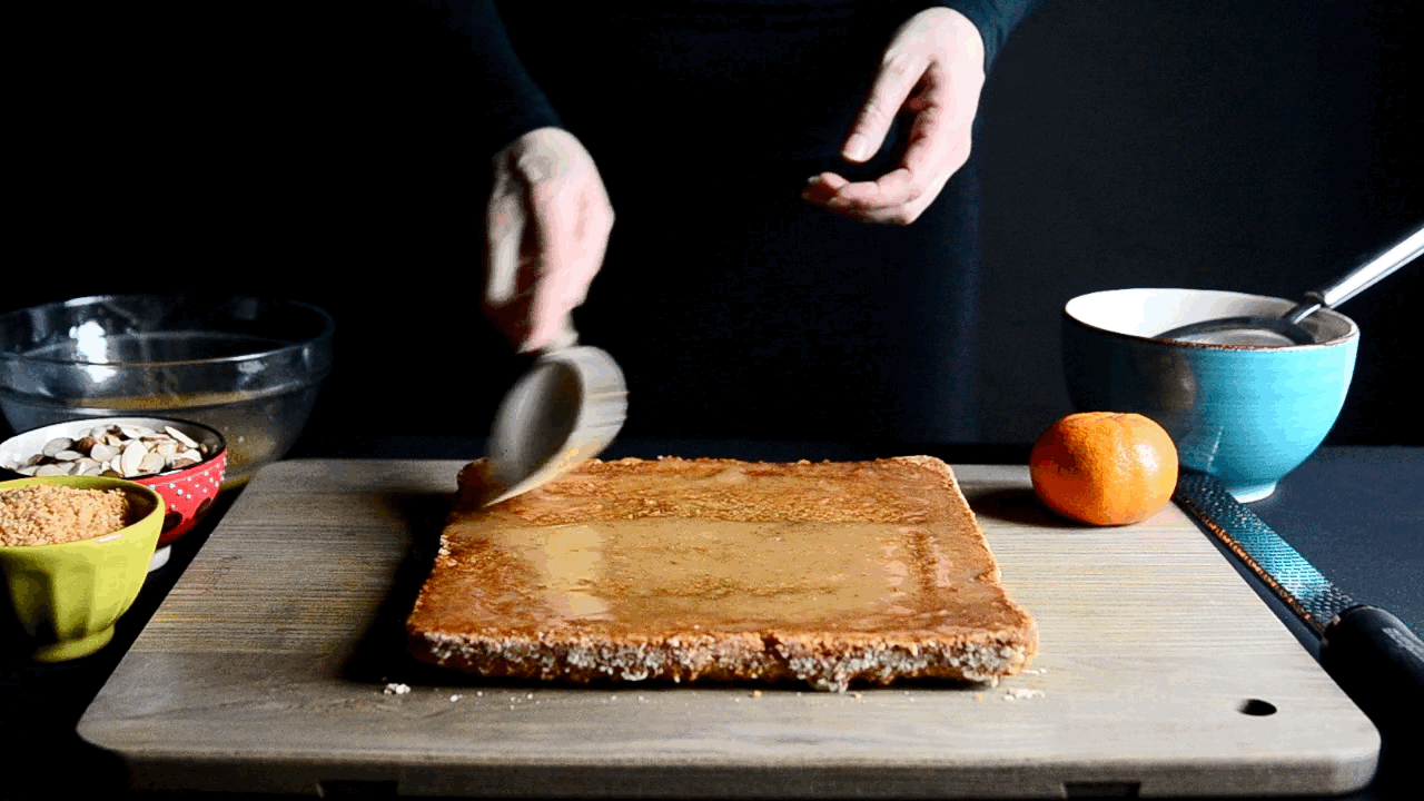 Whole Satsuma Almond Squares topped with Glaze, Toasted Coconut and Zest | Seed Plant Water Grow