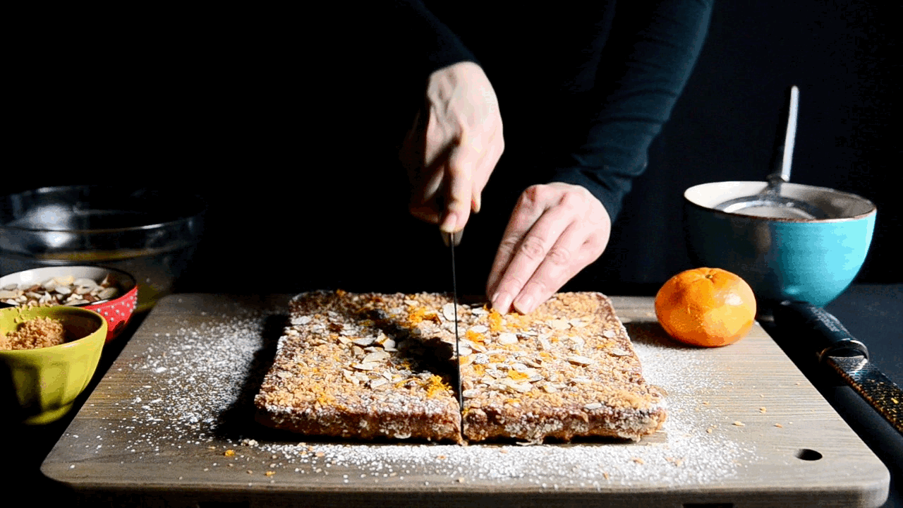 Whole Satsuma Almond Squares topped with Glaze, Toasted Coconut and Zest | Seed Plant Water Grow