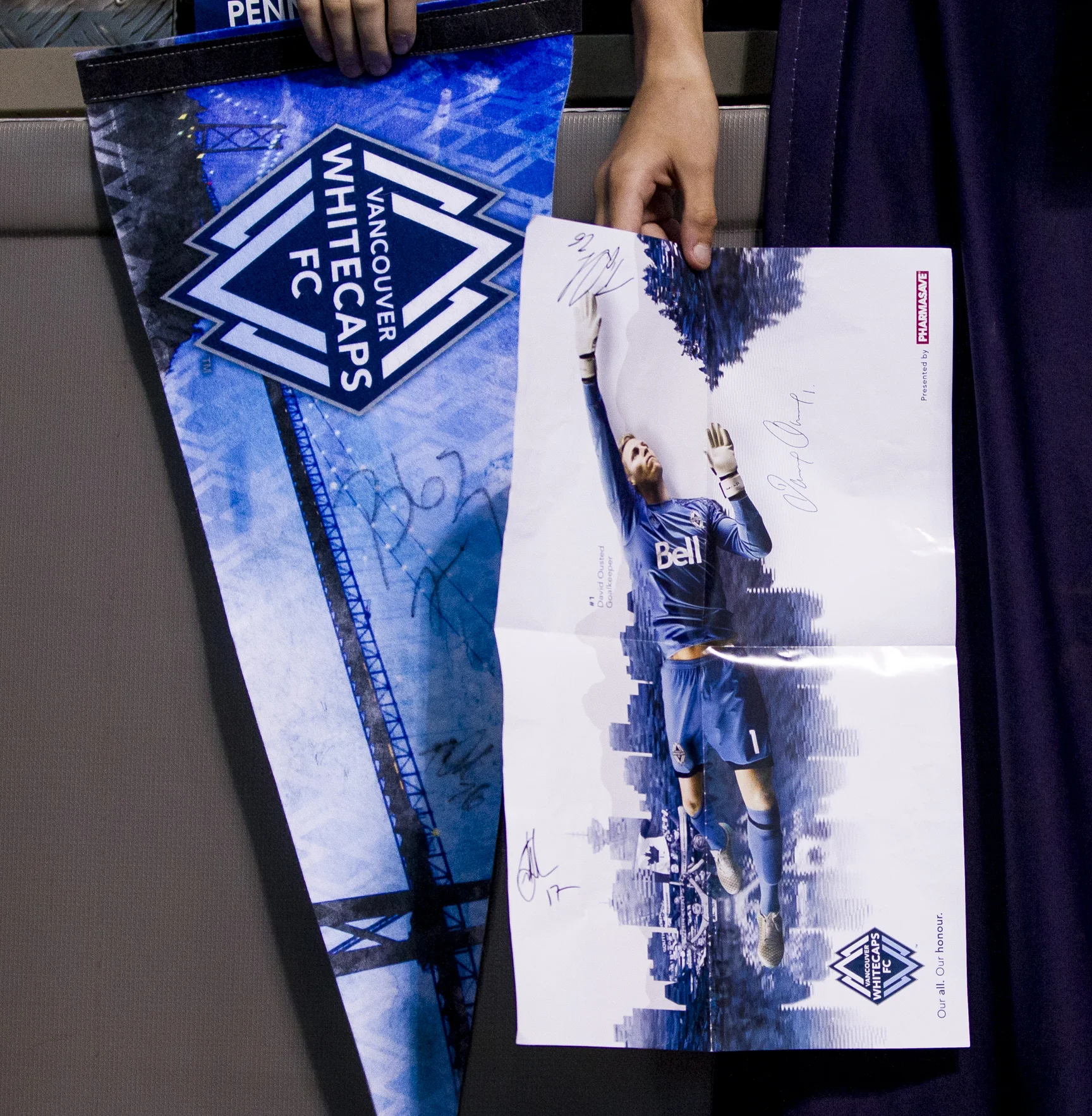  Match program with match information and posters. 