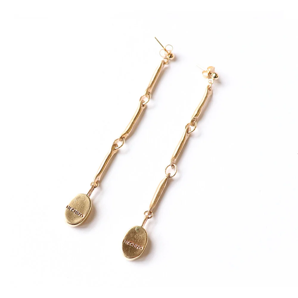 Link_Seed_Earrings_White_Detail_Sm.jpg