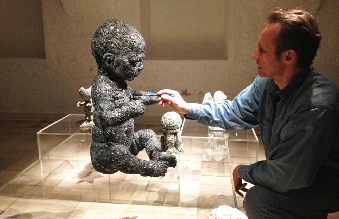 The artist Vladimir Anselm preparing his solo show MythSight at the Gallery 9/1 in Moscow. Opens 20 September 2013. Courtesy of the artist and Gallery 9/1.