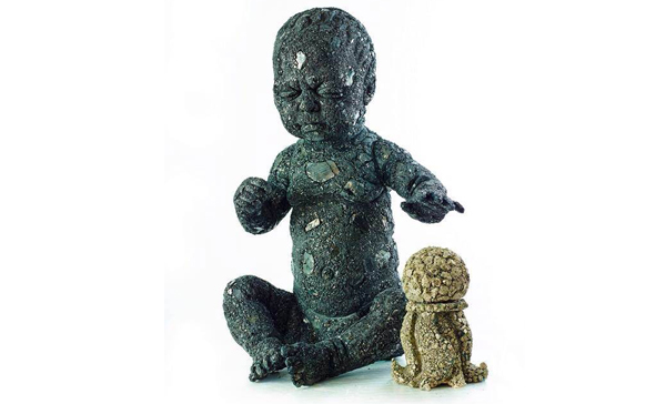 Vladimir Anslem, boy Sculpture in coal with object in pyrite, 2013. Courtesy of the artist.