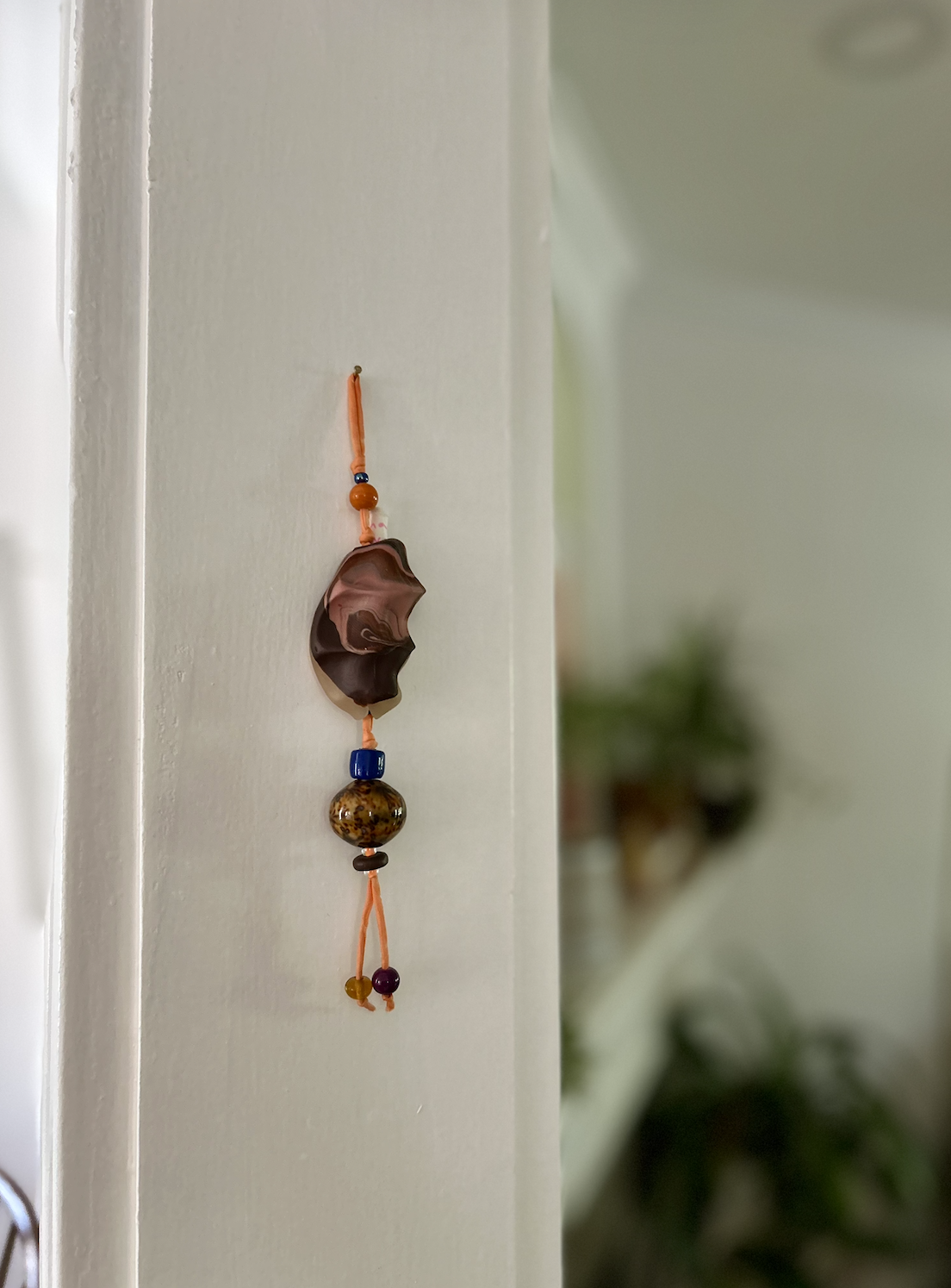 hamsa mezuzah on doorpost.png