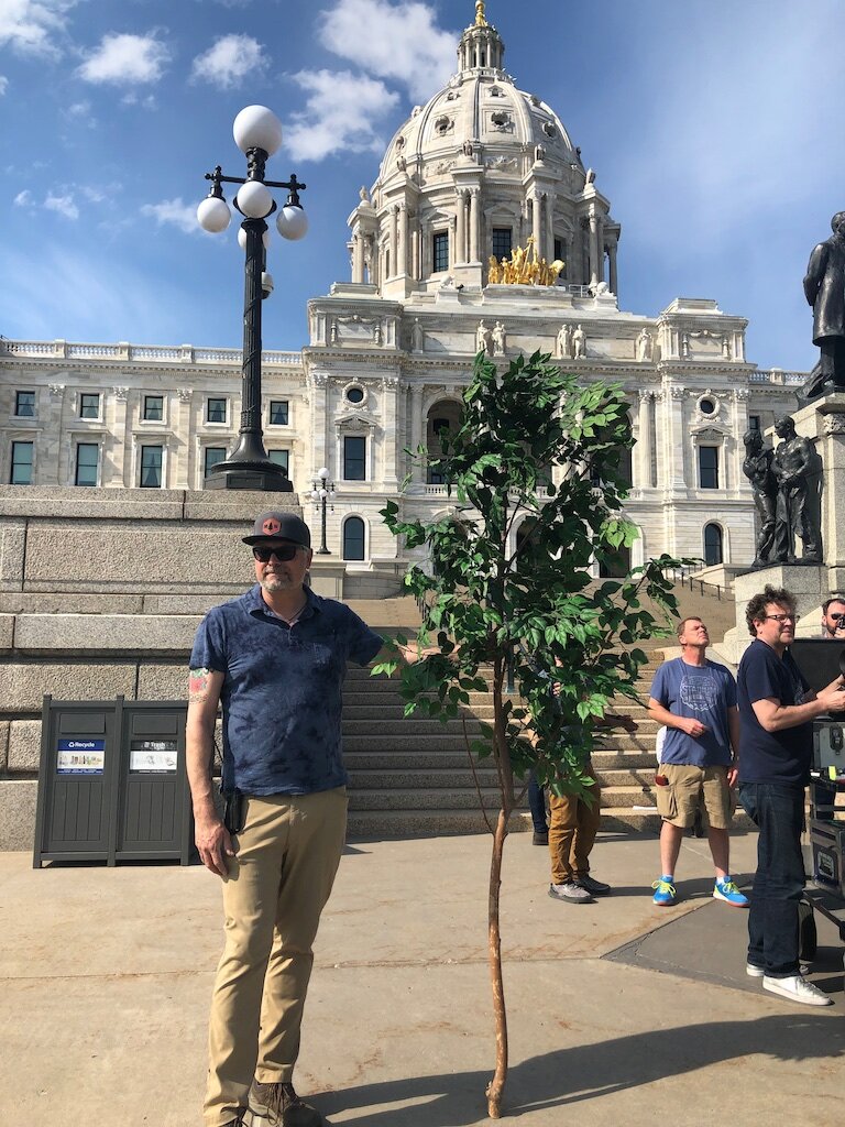 490 Art Director Mark Wojahn stands near set with some greens for the Google Start ups shoot.