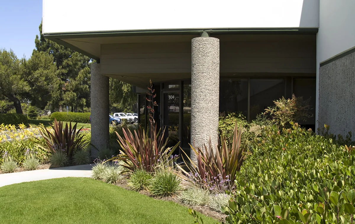 Pacifica Real Estate Company hired Enviroscaping to manage the replanting of this large commercial property, Skyway Industrial Park in Santa Maria. Shown here is just one of the many commercial office spaces maintained by a full-time Enviroscaping gardener.