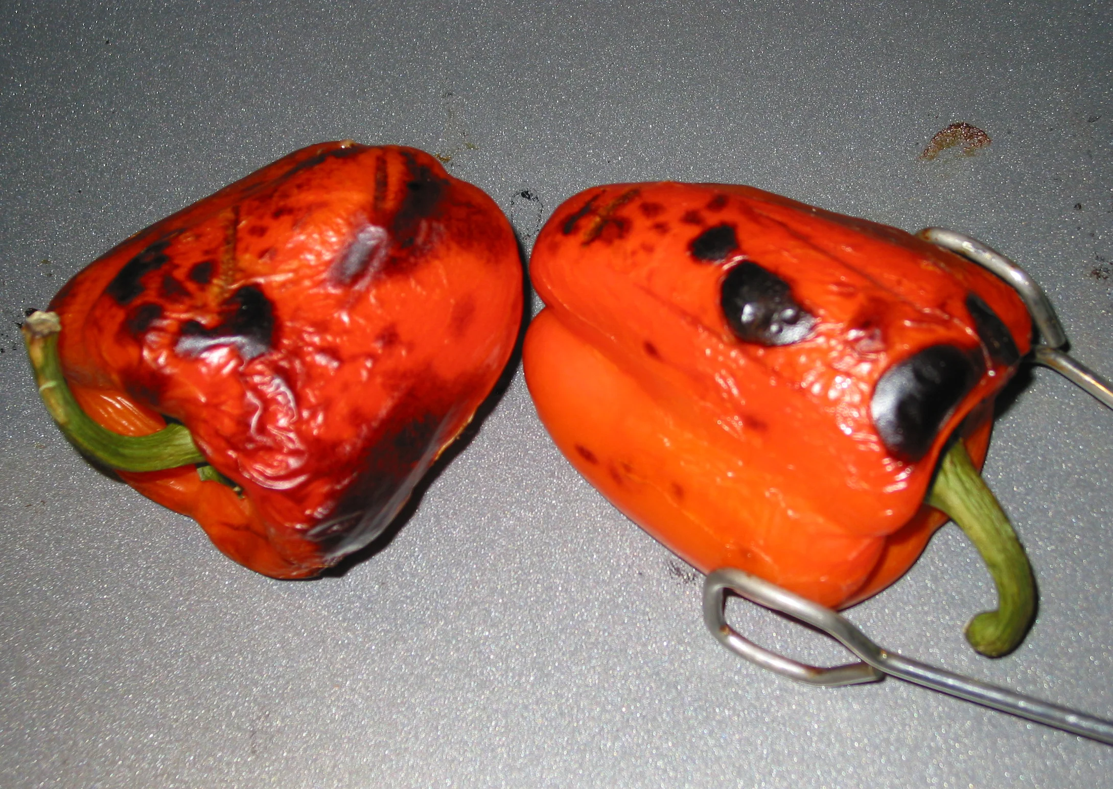 red bell peppers broiling in the oven