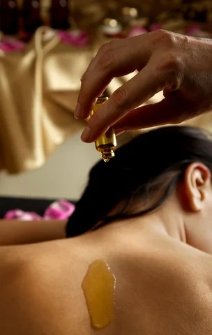 woman oil on back.jpg