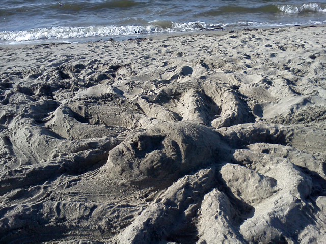 Sand sculpture by artist, Eliza Furmansky, of Medusa