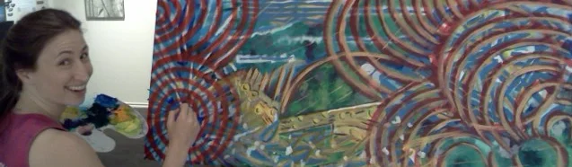 Eliza Furmansky in the act of creating a collaborative acrylic improvisation on board.