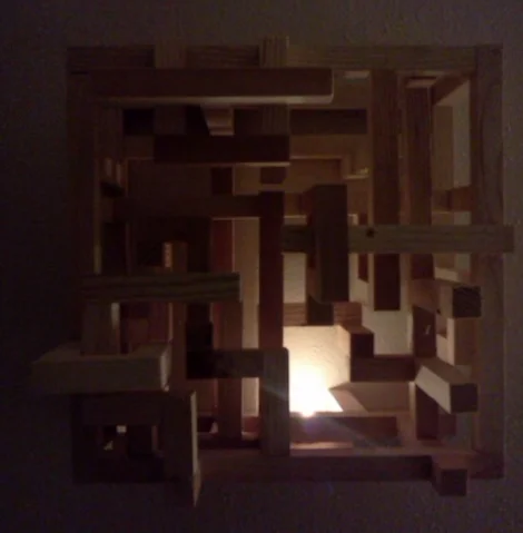 Light and Shadow Box #1 by Eliza Furmansky. Made from ripped down pine boards broken by Quantum Martial Artists. 2013