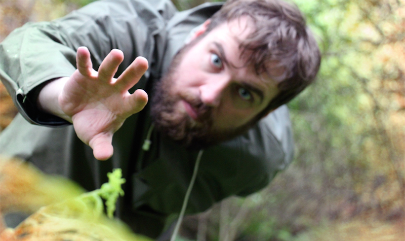 Hand outstretched, green jacket web.jpg
