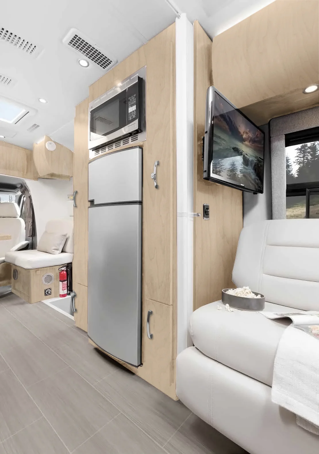 The Serenity lounge area has a large flat screen TV and great windows and seating