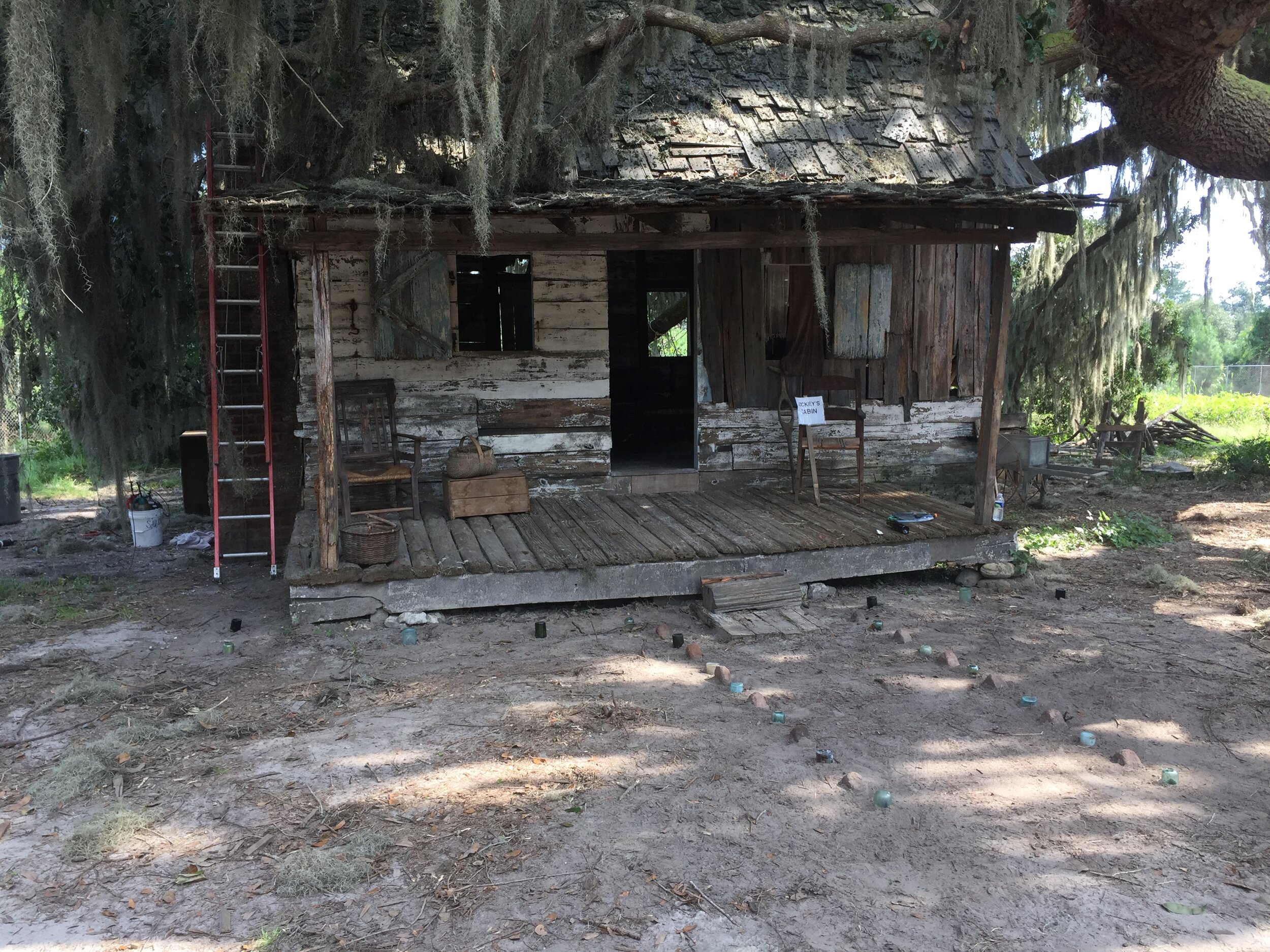  The Underground Railroad Set Installations, 2019  Glass Bottles, Bricks, Sea Shells, Oyster Shells, Sea Glass, Kitchen Utensils, Logs 